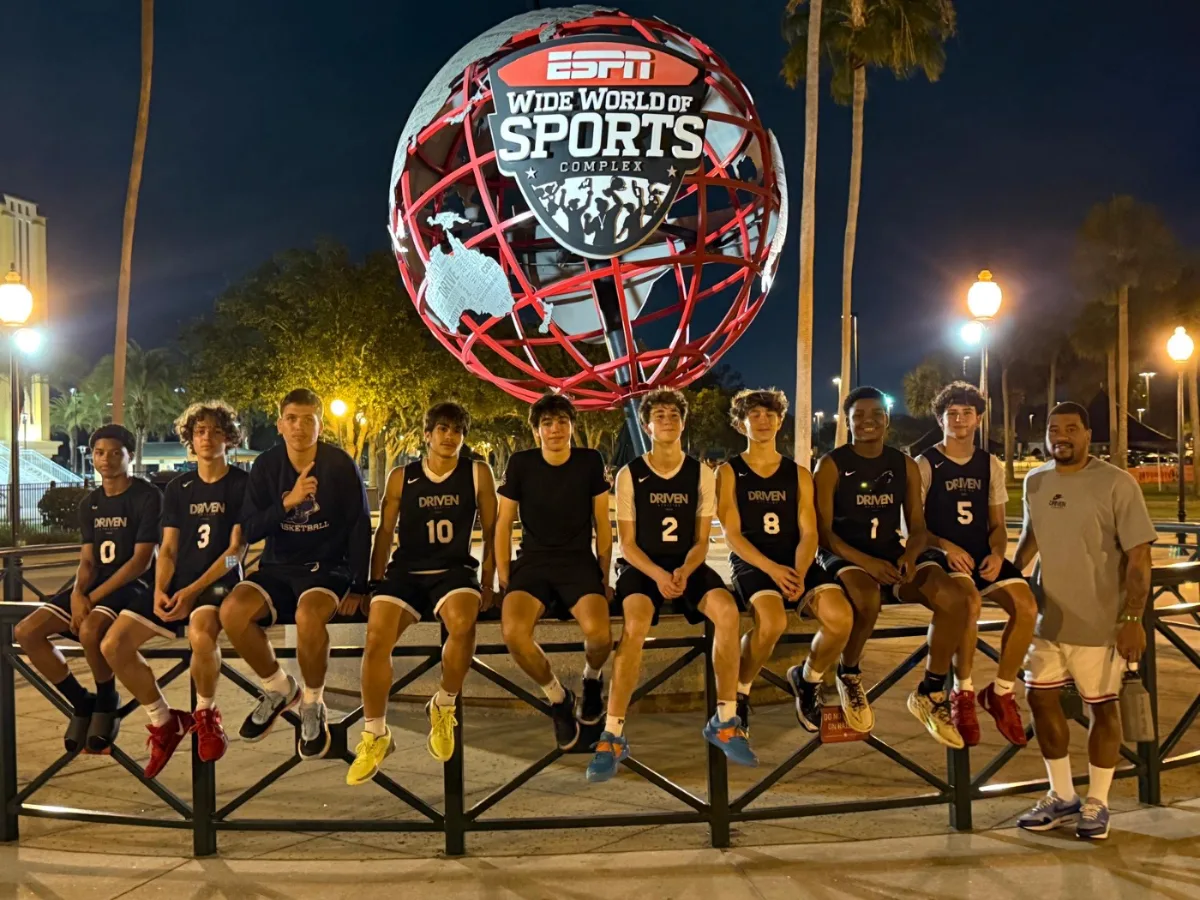 Driven Athletes travel team with their coach at a national tournament